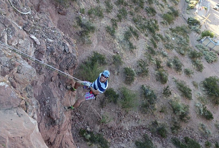 Rappelling Off Patagonia Mountain